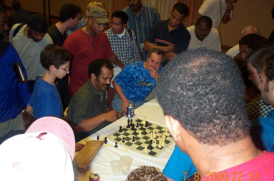 FM Emory Tate analyzing his game against GM Kudrin at 2001 World Open. Copyright , Daaim Shabazz.