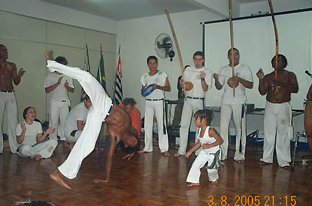 Young capoeirista accepts the challenge. Copyright © 2005, Daaim Shabazz.