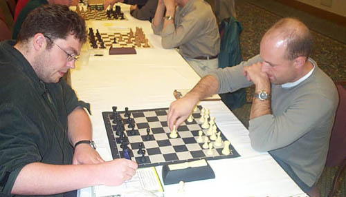 FM Jan van der Mortel of the Netherlands(left) playing against eventual champ, GM Alexander Shabalov. Copyright © 2003, Daaim Shabazz