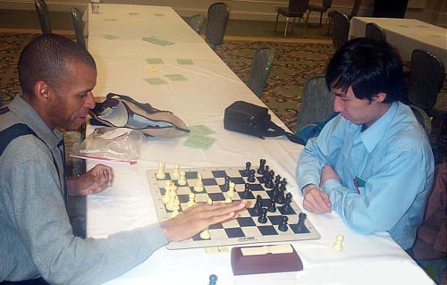 IM blitz clash! Stephen Muhammad vs. Bobby Kurniawan. Copyright  Daaim Shabazz, 2003.