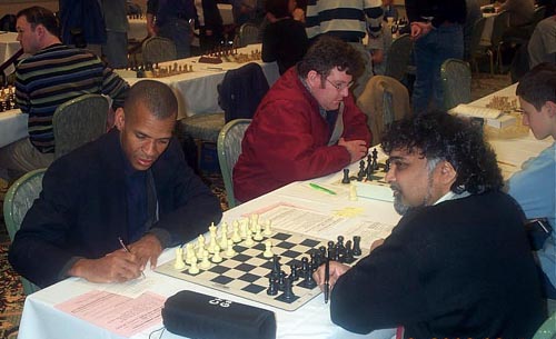 IM-elect Stephen Muhammad vs. FM Sunil Weeramantry. Copyright  Daaim Shabazz, 2003.