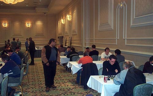 Round One Action at 2003 Foxwoods Open. Copyright  Daaim Shabazz, 2003.