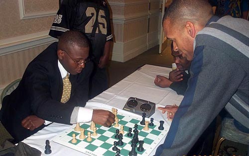 Sylvester Smarty vs. Muhammad in midnight blitz battle... the results were not encouraging for Smarty. Copyright  Daaim Shabazz, 2003.