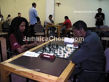 Ras Malaku Lorne vs. Daren Wisdom. Copyright  2004, JamaicaChess.com