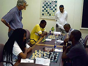 Ras Malaku Lorne vs. Warren Elliott (front) and Daren Wisdom vs. Mark Holness (back). Copyright  2004, Mark Bowen