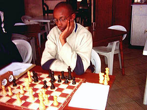Matthew Kanegeni  was the only player who managed to grab a point from the Champion Gohil. He in turn lost to Martin Gateri who lost to Makatia in an exciting tension packed match. Copyright  Alex Makatia, 2005.