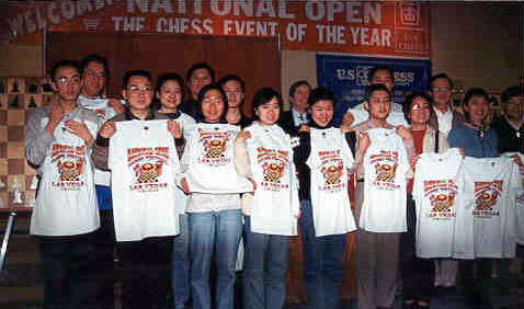 The Chinese National Team receiving gifts from the U.S. Chess Federation. Copyright  2003, Daaim Shabazz