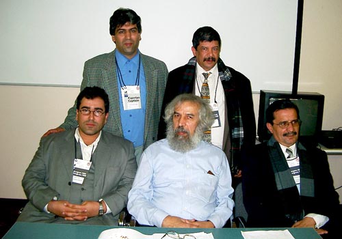 Representatives of Zone 4.1 pose after the African Continental Meeting. Seated at left and in the center are Nizar Ali Elhaj and Lakhdar Mazouz, respectively, the incoming and outgoing African Continental Presidents. Copyright © Jerry Bibuld, 2002.