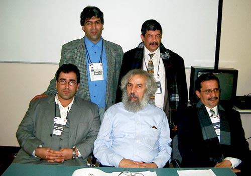 Representatives of Zone 4.1 pose after the African Continental Meeting. Seated at left and in the center are Nizar Ali Elhaj and Lakhdar Mazouz, respectively, the incoming and outgoing African Continental Presidents. Copyright  Jerry Bibuld, 2002.