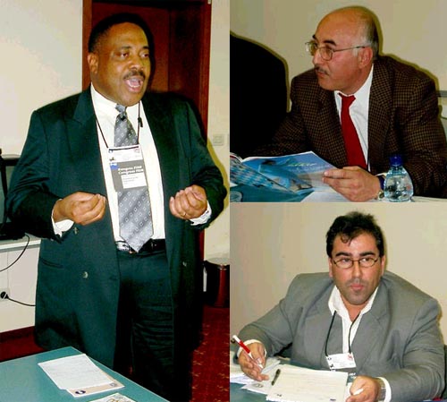 Candidates for African Continental President. (clockwise) Lewis Ncube (Zambia), GM Slim Bouaziz (Tunisia), Nizar Elhaj (Libya).  Copyright  Jerry Bibuld, 2002.