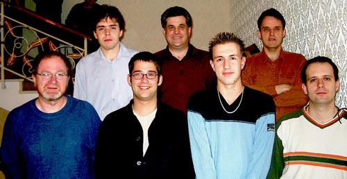 Canadian Players (front row, left to right) GM Kevin Spraggett (Bd. 2), IM Pascal Charbonneau (Bd. 3), IM Mark Bluvshtein (Bd. 5), GM Alexander Lesiege (Bd. 1); (back row, left to right) IM Yan Teplitsky (Bd. 4), Sid Belzberg (captain), IM Jean Hebert (Bd. 6). Copyright © Jerry Bibuld, 2002.