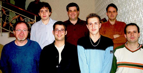 Canadian Players (front row, left to right) GM Kevin Spraggett (Bd. 2), IM Pascal Charbonneau (Bd. 3), IM Mark Bluvshtein (Bd. 5), GM Alexander Lesiege (Bd. 1); (back row, left to right) IM Yan Teplitsky (Bd. 4), Sid Belzberg (captain), IM Jean Hebert (Bd. 6). Copyright  Jerry Bibuld, 2002.