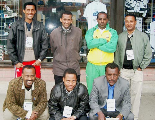 Ethiopia's Mens Team. (kneeling, from left to right) are Dewit Wondimu (Bd. 1), Fikreselassie Alemu (Bd. 2), Yimam Abera (Bd. 3); standing (from left to right) Abenet Bekele (Bd. 4), Mekitu Molla (Bd. 5), Wossenyelew Hailu (Bd. 6) and the Team Captain, Tsega Kumlachew. Copyright  Jerry Bibuld, 2002.