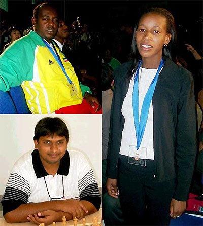 (clockwise) Wossenyelew Hailu, Ethiopia (bronze on Board 6); Boikhutso Mudongo, Botswana (bronze on Board 4); Ravishen Singh, Trinidad and Tobago (bronze on Board 5). Copyright © Jerry Bibuld, 2002.