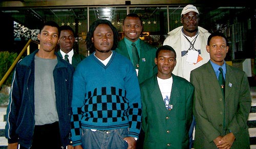 Zimbabwe's Mens Team (front, from left to right) IM Robert Gwaze (Bd. 1), Takaedza Chipanga (Bd. 2), Michael Luberto (Bd. 3) and Charles Chakanyuka (Bd. 4); from left to right (in the rear), Wisdom Chikwanda (Bd. 5), Rangariral Karumazondo (Bd. 6) and Charles Kuwaza, (captain). Copyright  Jerry Bibuld, 2002.