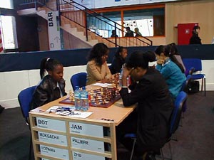 Botswana vs. Jamaica (Women). Copyright  Barbados Chess Federation, 2002.