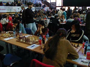 Chinese Women: Zhu Chen, Wang Ping, Zhao Xue. Copyright  Barbados Chess Federation, 2002.