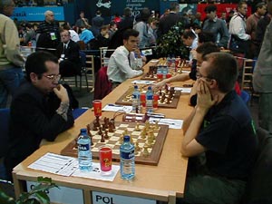 Cuba vs. Poland (Men). Copyright  Barbados Chess Federation, 2002.