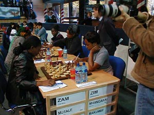 Zambia vs. Zimbabwe (Women). Copyright © Barbados Chess Federation, 2002.