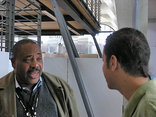 Zambias Lewis Ncube (left) conversing with Allan Herbert of Barbados. Copyright  2006, Daaim Shabazz.