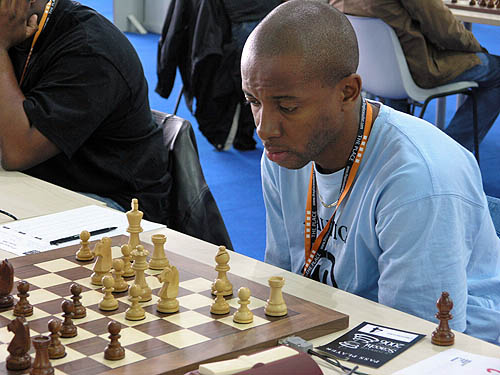 Russel Porter (Jamaica) enroute to an upset win over GM Heikki Westerinen. Copyright  2006, Daaim Shabazz.