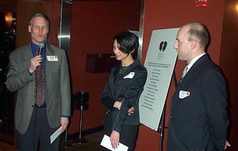 Erik Henderson awarding WIM Anna Hahn and GM Alexander Shabalov their prizes.