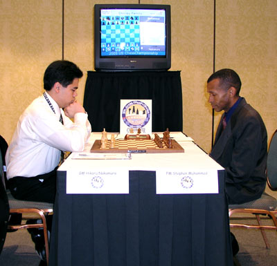 Hikaru Nakamura faces off against Stephen Muhammad in round 1 of the 2005 U.S. Chess Championship. Photo by John Henderson.