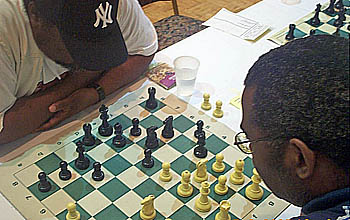 Peter Roberts vs. Okechukwu Iwu. Copyright © 2005, Daaim Shabazz.