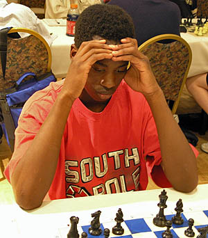 Jacob Wamala is one of the brightest scholastic stars on the horizon. He is the high school co-champion of Massachusetts and has a sister Jessica Wamala who will represent the state at the Polgar tournament for the second year in a row. Photo by Daaim Shabazz.