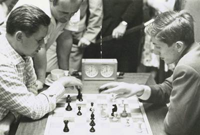 Paul Keres analyzing with Bobby Fischer in their game at the 1962 Curaçao Candidates Tournament. Keres won in a Ruy Lopez.