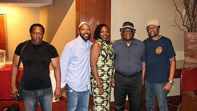 Beejay Hicks, Abdullah Abdulbashir, Adia Onyango, Walter Harris, Kenneth Moody at 2014 World Open in Arlington, Virginia. They are posing with fellow New Yorker Walter Harris (second from right), the first Black player to earn the National Master title. Photo by Daaim Shabazz.