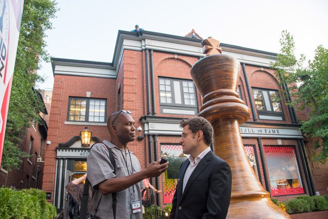 In front of the World Chess Hall of Fame interviewing Levon Aronian after his win at the 2017 GCT Rapid & Blitz. In front of the World Chess Hall of Fame interviewing Levon Aronian after his win at the 2017 GCT Rapid & Blitz.