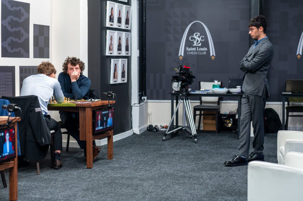 Hans Niemann on his way to beating the world champion as Alireza Firouzja looks on.
Photo by Crystal Fuller