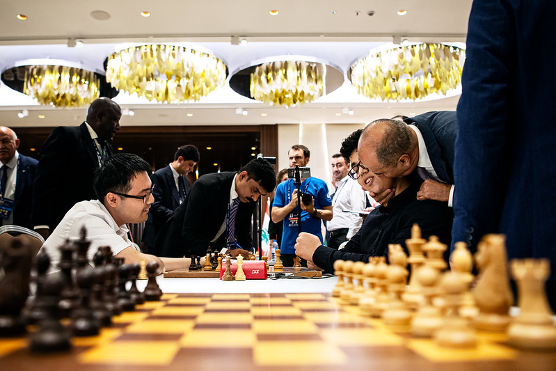 Suleymanli gets congratulations from the President of the Azerbaijan Chess Federation. Photo by Stev Bonhage