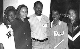 The Angolan Women's Team with IM Manuel Mateus; 1996 Chess Olympiad, Armenia. L-R: Engracia de Jesus, Paulete Cabral, MI Manuel Mateus, Sandra Venancio and Maria da Luz. Copyright  1996, Jerome Bibuld.