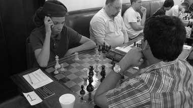 Kassa Korley plays GM Surya Ganguly in the 2010 New York International. Photo by Ron Anderson.