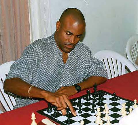 NM Mark Holness. Copyright ©, Jamaican Ambassadors Chess Academy.