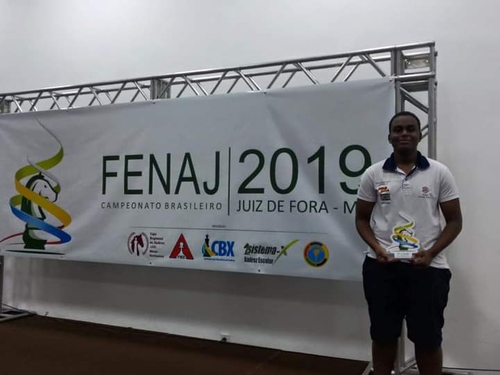 Ryan Caetano with championship trophy at FENAC 2019!