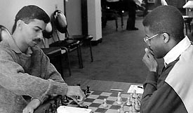 Deon Solomons of South Africa facing IM Maurice Ashley in the 1st Murphy International tournament.. Copyright  1994, Jerome Bibuld.