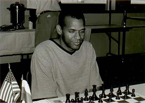 Stephen Muhammad competing at invitational at St. John’s University. Photo by Jerry Bibuld.