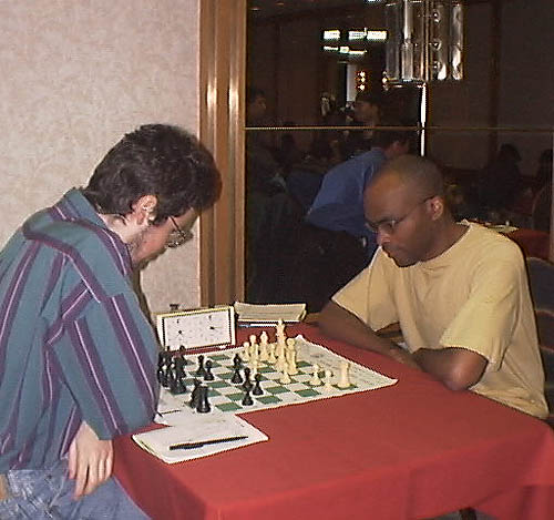 Canadian transplant NM Vincent Tipu plays IM Michael Schleifer (23 April 2000). Tipu moved to Canada with his parents from Atlanta, USA. He was a young talented player with promise, but apparently has found a successful career in engineering. I remember him because I was a graduate student in Atlanta. (Shabazz)