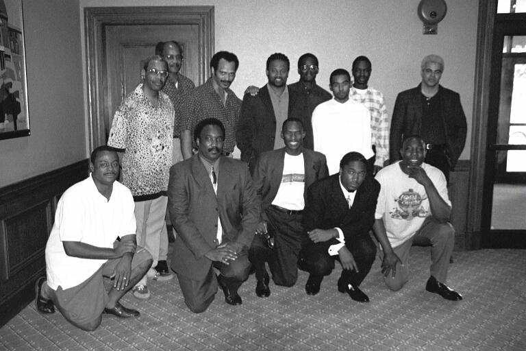 Kneeling (L-R) FM William Morrison, NM David Allen, Sr., Daaim Shabazz, David Allen, Jr., Sulaiman Smith. Standing (L-R): NM Charles Covington, NM Frank Street, FM Emory Tate, GM Maurice Ashley, Jones Murphy, Jr., FM Kenny Solomon, NM Grace Nsubuga, NM Ernest Steve Colding;
2001 World Open in Philadelphia. Copyright  2001, Frank Johnson.