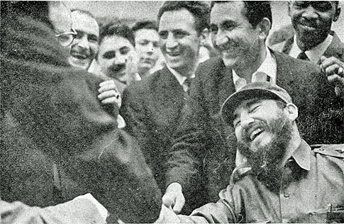 Fidel Castro shaking hands with Bobby Fischer at the 1966 Chess Olympiad in Havana. Tigran Petrosian is behind Castro and was World Champion at the time. An unidentified person of African descent is behind Petrosian. Is that Rogelio Ortega, the 1966 Cuban champion??