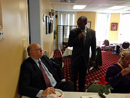 Bill Brock and Daaim Shabazz chatting.