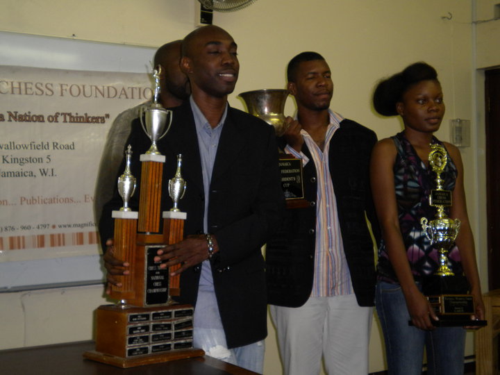 FM Warren Elliott and WFM Deborah Richards receive their trophies. Photo by Peter Myers.