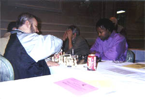 GM Alexander Ivanov vs. GM Maurice Ashley in last round encounter. Copyright  2002, Daaim Shabazz.