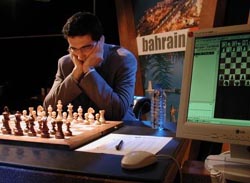 GM Vladimir Kramnik preparing his first move against Deep Fritz. Photo courtesy of ChessBase. WIDTH= 