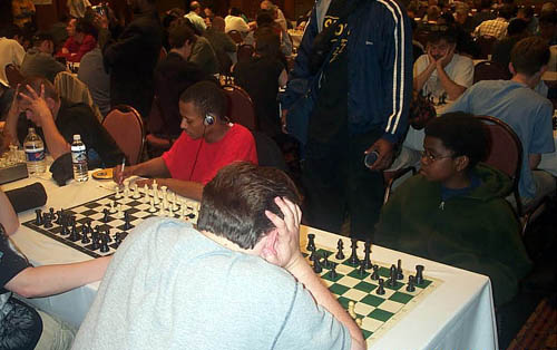 Kayin Barclay (far right) on board #1 in last round of Chicago Open. Next to him is Joseph Gadson of Detroit, Michigan who finished 5-2. Copyright  2003, Daaim Shabazz