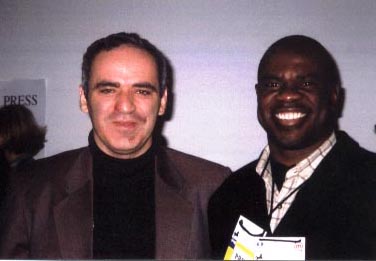 JCF President, Ian Wilkinson with GM Garry Kasparov at the 2002 Olympid in Bled, Slovenia. Photo courtesy of Jamaica Chess Federation