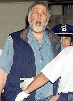 Fischer being detained by Japanese authorities in 2004. He claimed that he was abused.